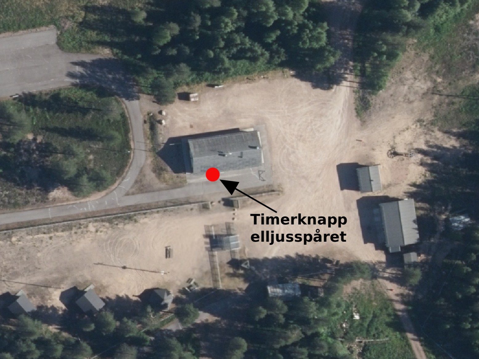 Kartbild var du hittar timerknapp för belysning längs elljusspåren